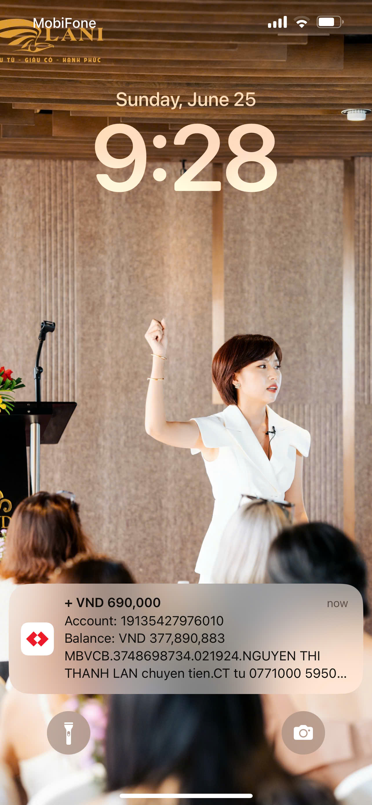 Presentation by woman in black dress
